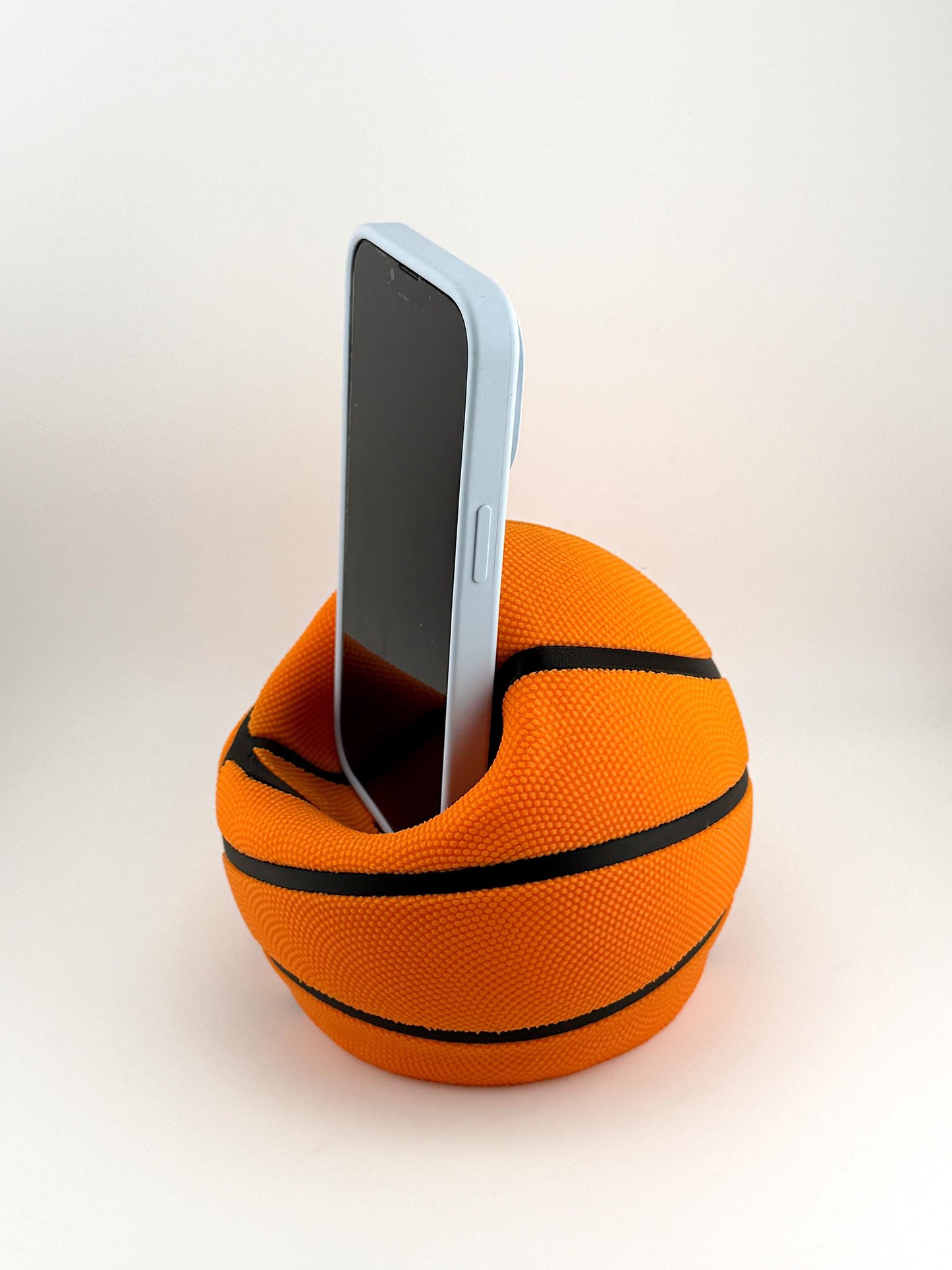 Basketball Slam Dunk Phone Holder and Charging Stand with Black Seams and Hidden Charging Cord Holder