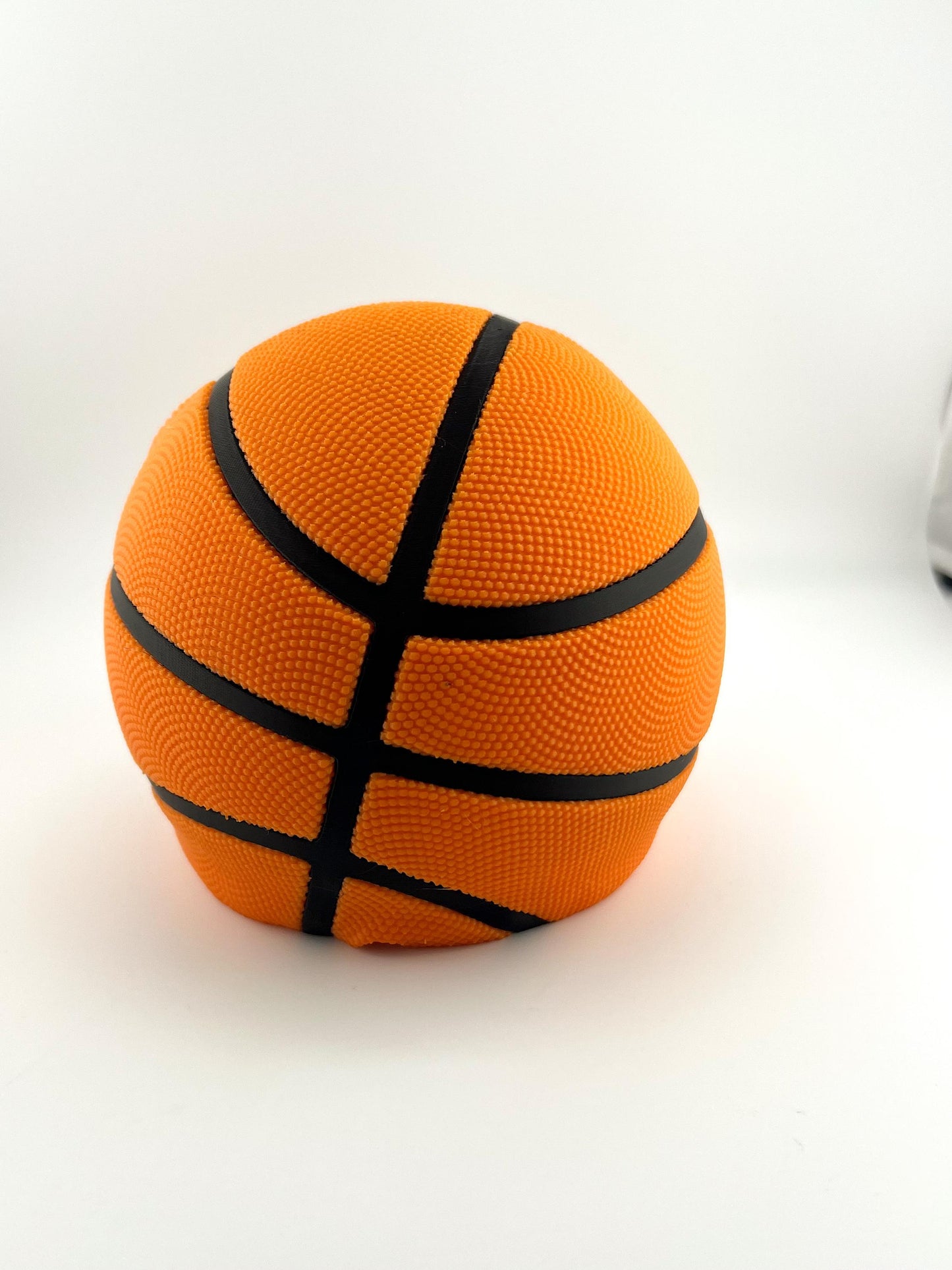Basketball Slam Dunk Phone Holder and Charging Stand with Black Seams and Hidden Charging Cord Holder