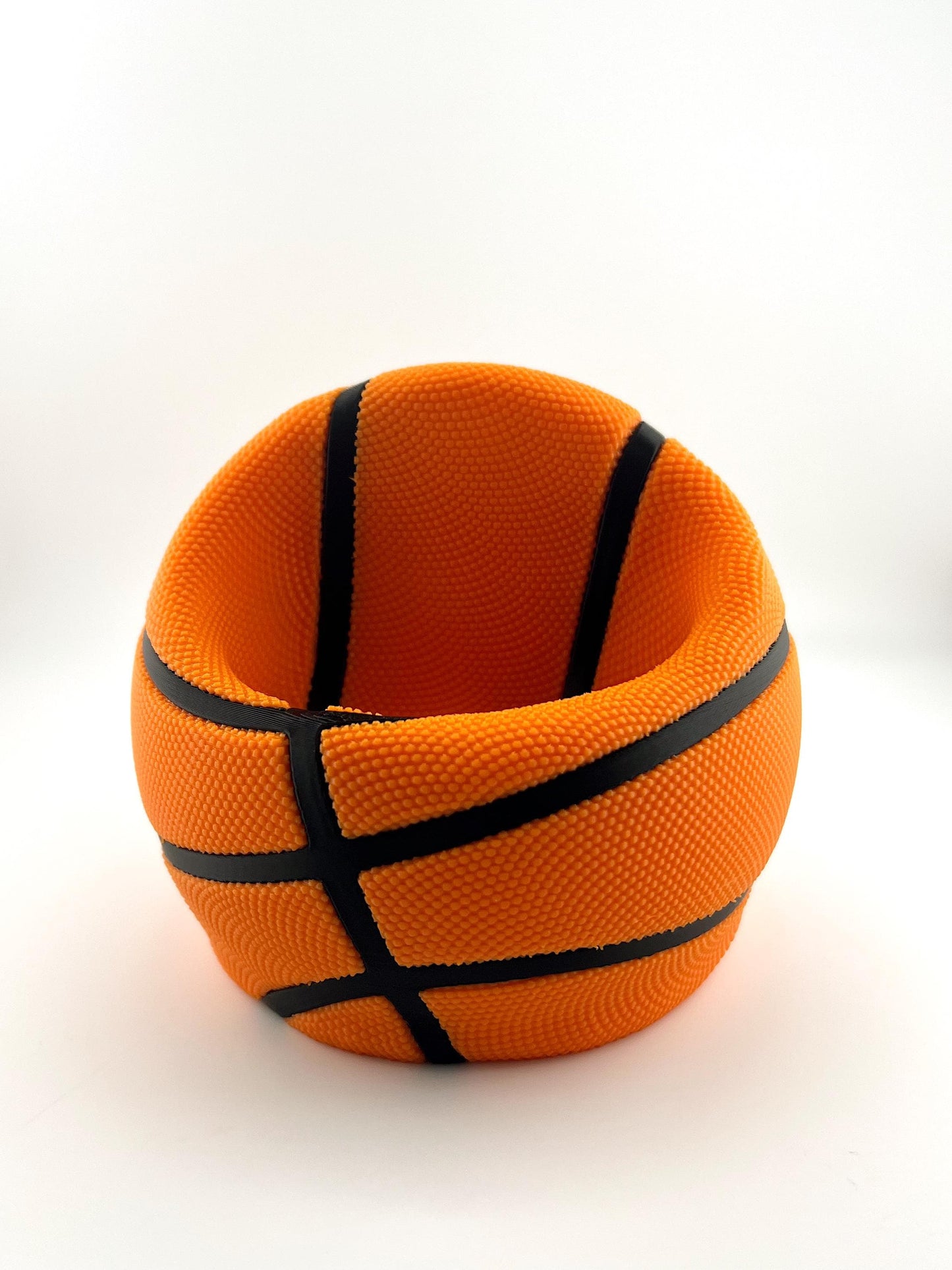 Basketball Slam Dunk Phone Holder and Charging Stand with Black Seams and Hidden Charging Cord Holder